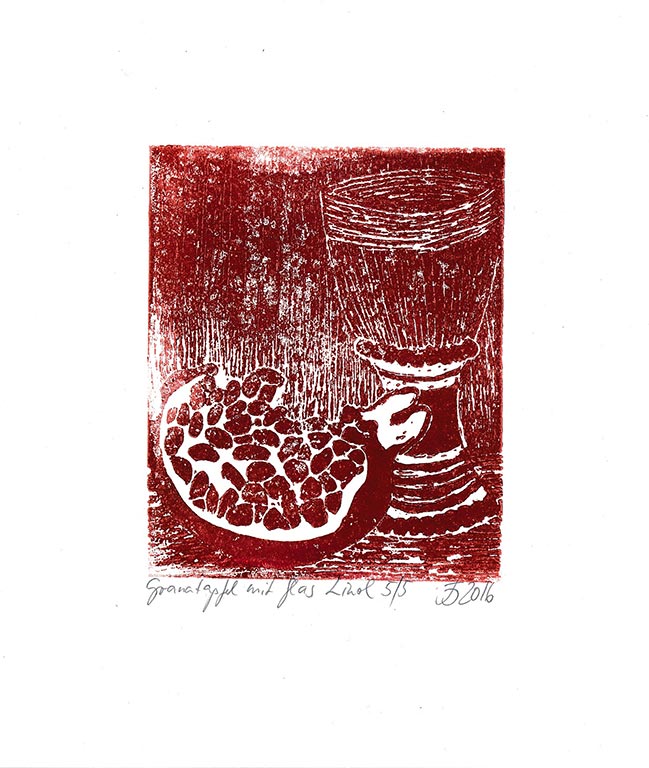 Granatapfel mit Glas